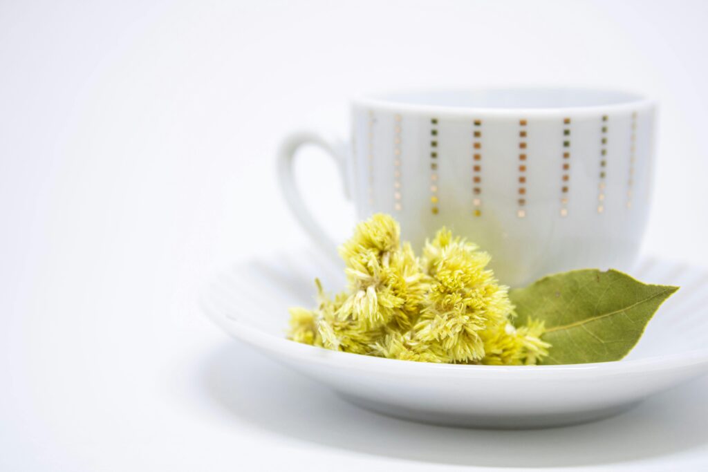 White Ceramic Cup on a Saucer